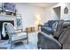 Elegant living room includes a decorative fireplace, comfortable seating, and stylish decor at 2566 Summit Cove Dr, Duluth, GA 30097