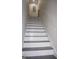 Staircase showcasing clean lines and a modern design leading to the next level of the home at 2566 Summit Cove Dr, Duluth, GA 30097