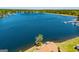 Captivating aerial view of a lakefront property featuring a home with a terracotta-colored roof near a marina at 294 Clearview Ct, Villa Rica, GA 30180