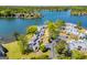 Beautiful aerial view of lakefront townhomes with mature trees and green spaces, nestled on the serene waterside at 294 Clearview Ct, Villa Rica, GA 30180