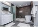 Modern bathroom features a glass shower, separate soaking tub, and tiled floors at 294 Clearview Ct, Villa Rica, GA 30180