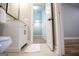 Well-lit bathroom features a white vanity, a white toilet and a white bathmat at 294 Clearview Ct, Villa Rica, GA 30180