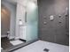 Modern bathroom features a glass shower, tiled floors, and a white vanity at 294 Clearview Ct, Villa Rica, GA 30180