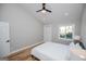Well-lit bedroom with a large window, closet, and a ceiling fan at 294 Clearview Ct, Villa Rica, GA 30180