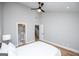 A vaulted ceiling, light-colored walls, and modern flooring makes this bedroom relaxing at 294 Clearview Ct, Villa Rica, GA 30180