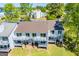 Aerial view of condo exteriors, showcasing multiple units with outdoor decks and well-maintained grounds at 294 Clearview Ct, Villa Rica, GA 30180