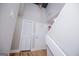 Bright foyer featuring high ceilings, wood floors, and contemporary light fixtures at 294 Clearview Ct, Villa Rica, GA 30180