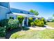 Charming townhome with well-manicured landscaping and a stone walkway leading to the entrance at 294 Clearview Ct, Villa Rica, GA 30180
