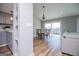 View of the dining area with seating for four, open floor plan, and sliding glass doors to the outside at 294 Clearview Ct, Villa Rica, GA 30180