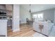 Open floor plan with a view of the kitchen, dining area, and living room with modern design elements at 294 Clearview Ct, Villa Rica, GA 30180