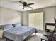 Bedroom with ceiling fan, and a window providing natural light at 247 Water Oak Ln, Jonesboro, GA 30238