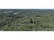 Aerial view of heavily wooded land parcel surrounded by mature trees at 3644 Graycliff Rd, Snellville, GA 30039