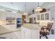Charming kitchen featuring white cabinetry, granite countertops, and stainless steel appliances at 3644 Graycliff Rd, Snellville, GA 30039