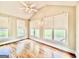 Bedroom with hardwood floors and lots of natural light at 6680 Bentley Trl, Cumming, GA 30040