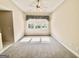 Bright bedroom with large window and neutral paint, ready for your personal touch at 6680 Bentley Trl, Cumming, GA 30040