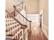 Bright foyer with hardwood floors and staircase at 6680 Bentley Trl, Cumming, GA 30040