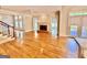 Spacious living room with fireplace and lots of natural light at 6680 Bentley Trl, Cumming, GA 30040