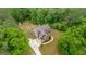 A beautiful property including the residence, driveway, and surrounding landscape at 1233 Butler Bridge Rd, Mcdonough, GA 30252