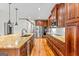 Gourmet kitchen with custom cabinets, stainless steel appliances, and a center island at 1233 Butler Bridge Rd, Mcdonough, GA 30252