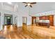 Spacious living room featuring an open kitchen and elegant front door at 1233 Butler Bridge Rd, Mcdonough, GA 30252