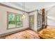 Open floorplan featuring a bright living room adjacent to the kitchen at 1233 Butler Bridge Rd, Mcdonough, GA 30252
