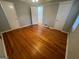 Bedroom with hardwood floors, two closets, and neutral paint at 1329 Springwood Nw Dr, Conyers, GA 30012