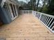 Inviting deck with painted white railings and French doors, perfect for outdoor entertaining and relaxation at 1329 Springwood Nw Dr, Conyers, GA 30012
