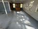 Attached garage with built in cabinets with painted floor and natural light at 1329 Springwood Nw Dr, Conyers, GA 30012