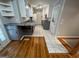 Open concept kitchen showcasing tiled floor, gray cabinets, and ample counter space at 1329 Springwood Nw Dr, Conyers, GA 30012