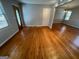 Bright living room featuring hardwood floors and an open layout for entertaining at 1329 Springwood Nw Dr, Conyers, GA 30012