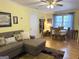 Open living room with dining area, showcasing comfortable seating and natural light at 712 Honeysuckle Ln, Temple, GA 30179