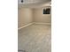 Spacious basement area featuring tile floors and good lighting at 1607 Hillview Ave, Jonesboro, GA 30236