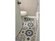 Bathroom showcases unique and colorful patterned tile flooring at 1607 Hillview Ave, Jonesboro, GA 30236