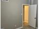 Cozy bedroom with neutral wall and a doorway leading to another room at 1607 Hillview Ave, Jonesboro, GA 30236