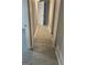Long hallway with tile flooring leading to multiple rooms at 1607 Hillview Ave, Jonesboro, GA 30236