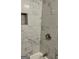 Nicely tiled shower with a built-in niche offers style and convenience at 1607 Hillview Ave, Jonesboro, GA 30236