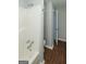 Bathroom featuring a bathtub, toilet, and updated fixtures with wood-look flooring at 292 S Prospect Ave, Waco, GA 30182