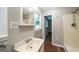 Bathroom with a vanity, mirrored medicine cabinet, and walk-in shower at 292 S Prospect Ave, Waco, GA 30182