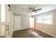 Comfortable bedroom includes ceiling fan, neutral walls, and natural light, ensuring relaxation at 292 S Prospect Ave, Waco, GA 30182