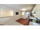Open kitchen with granite counters, stainless appliances, and a view into the living area at 292 S Prospect Ave, Waco, GA 30182