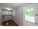 Convenient mudroom featuring built-in cabinets and a door leading to the outdoors at 292 S Prospect Ave, Waco, GA 30182