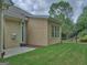 Exterior of home's backyard with grass and mature trees at 834 Chalet Hills, Mcdonough, GA 30253