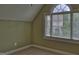 Bedroom with carpet, window, and light green walls at 834 Chalet Hills, Mcdonough, GA 30253