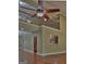 Spacious living room featuring hardwood floors, large ceiling fan, and an open view to the upper floor at 834 Chalet Hills, Mcdonough, GA 30253