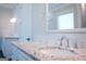 Powder room featuring dual sinks with granite countertops and modern fixtures at 368 Ginger Cake Rd, Fayetteville, GA 30214