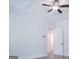 Bedroom showcases a tray ceiling, ceiling fan and view into the hall at 368 Ginger Cake Rd, Fayetteville, GA 30214
