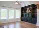 Spacious bonus room with built-in cabinets, offering ample storage and featuring bright windows for natural light at 368 Ginger Cake Rd, Fayetteville, GA 30214