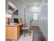Stylish home office with sleek desk, comfortable chair, and ample natural light from the entry door at 368 Ginger Cake Rd, Fayetteville, GA 30214