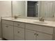 Bathroom vanity with dual sinks and storage at 3706 Cheswoilde Ave # 96, Powder Springs, GA 30127