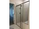 Modern bathroom features a tiled shower with glass doors and updated fixtures at 3706 Cheswoilde Ave # 96, Powder Springs, GA 30127